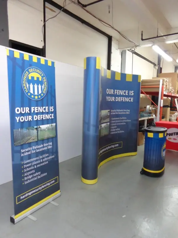 Hardings Security Magna Curved pop up 3 x 3 with digitally printed and laminated along with molded case can be used as counter with fabric wrap.